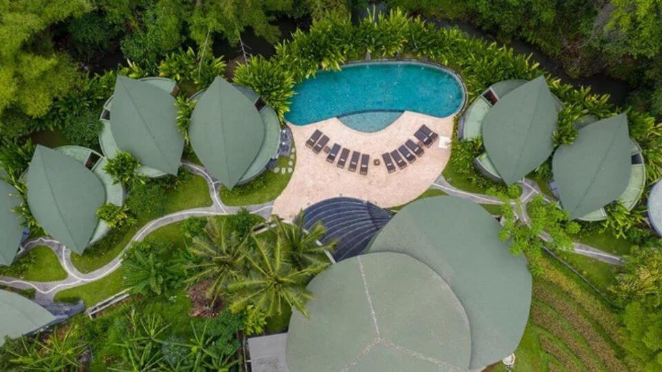 An overhead view of the idyllic setting at De Moksha Eco-friendly Boutique Resort, an incredible place for Bali wellness retreats.