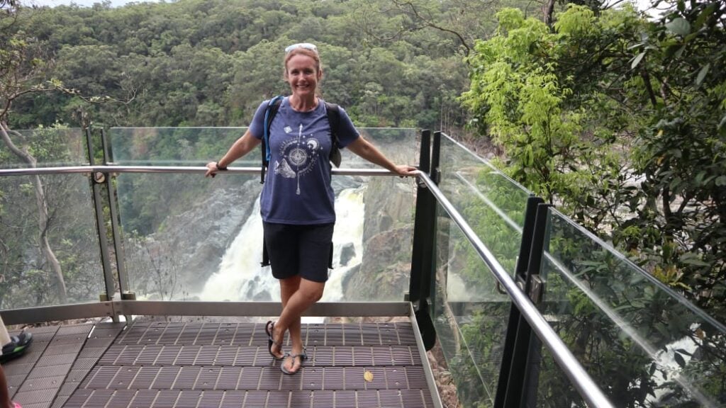 Elly wearing the Genesis minimalist sandal from Xero Shoes at Baron Falls in Far North Queensland, Australia.