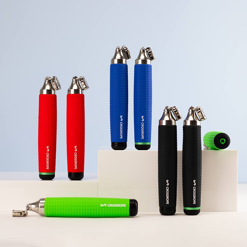Four different bright coloured pairs of Crossrope handles.